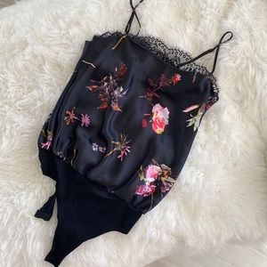 Bodysuit by Victoria’s Secret. Great Bargain for a brand new with tag piece.